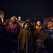 The crowd listens to three members of the Boychoir of Ann Arbor sing christmas carols after the tree lighting ceremony in Ypsilanti's Depot Town Saturday night. 
Courtney Sacco I AnnArbor.com 